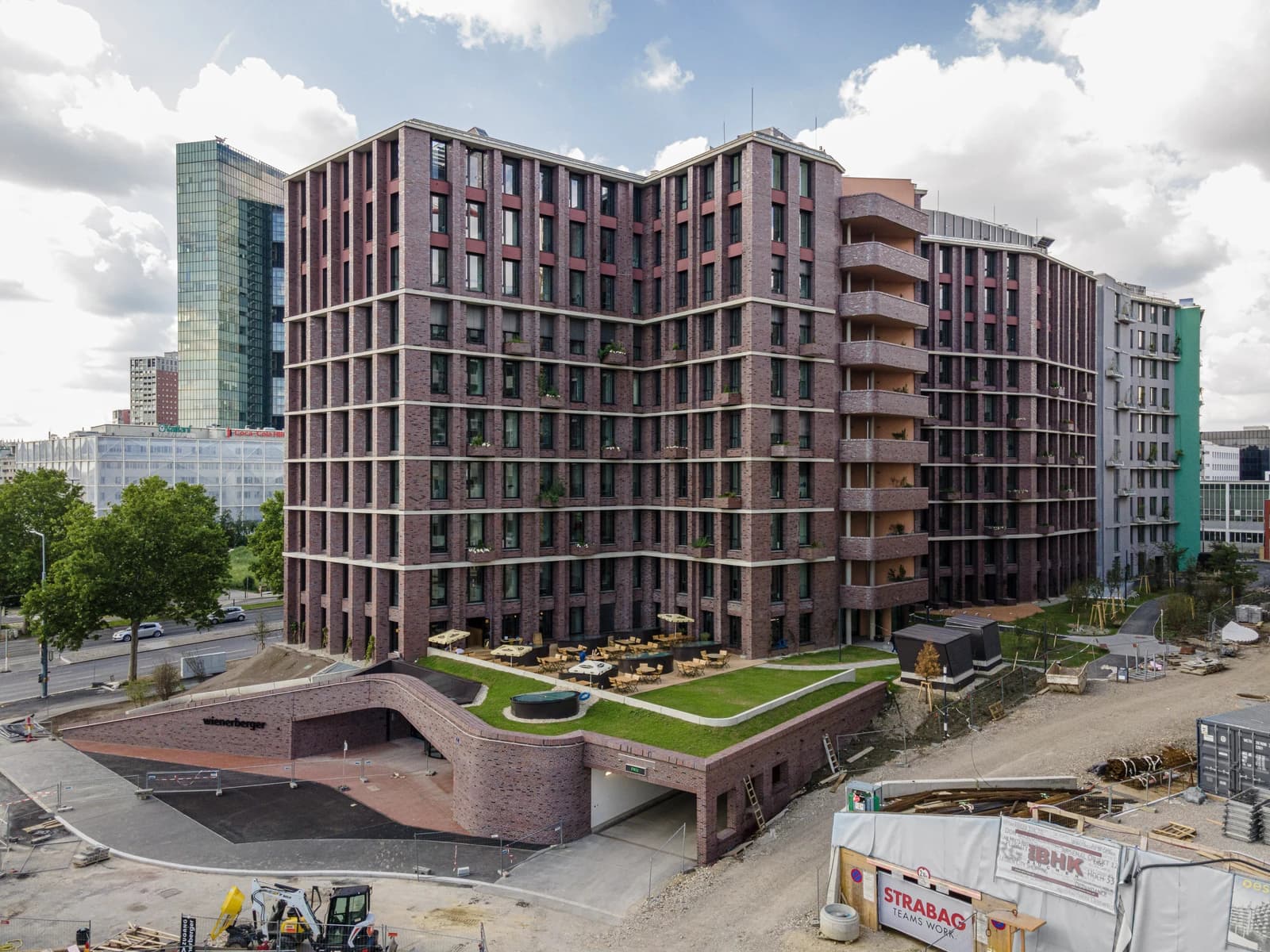 Aerial view of the Wienerberger AG headquarters building, a brick and glass structure.