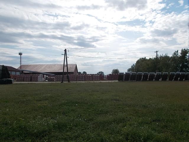Building with stacked bricks outside the Csorna factory in Hungary.