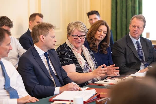 Cabinet members including Therese Coffey and Steve Barclay at a political meeting.