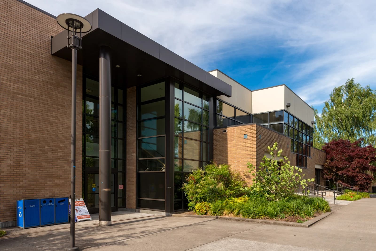 Exterior of the Portland Community College Student Union building on a sunny day.