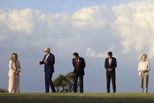 Prime Minister Giorgia Meloni, President Joe Biden, Prime Minister Fumio Kishida, Prime Minister Rishi Sunak, and Ursula von der Leyen stand outdoors.