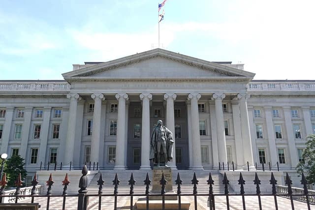 North side of the US Treasury Department building with Albert Gallatin statue.