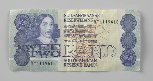 Vintage South African Two Rand banknote with 'South African Reserve Bank' visible.