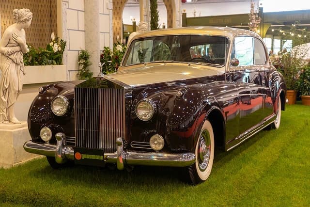 A 1962 Rolls-Royce Phantom V Coupe on display at an event.