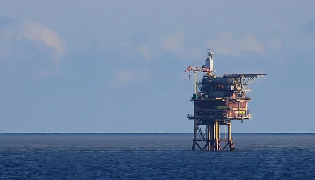 Unocal Oil Production Platform P9 Horizon, a large offshore oil rig, stands in the North Sea.