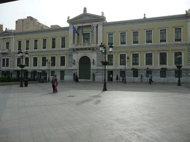 Exterior of the historic National Bank of Greece headquarters building in Athens, Greece.