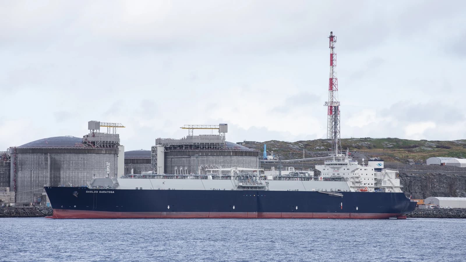 LNG Tanker Gaslog Saratoga docked next to gas processing facilities at Melkøya, Norway.
