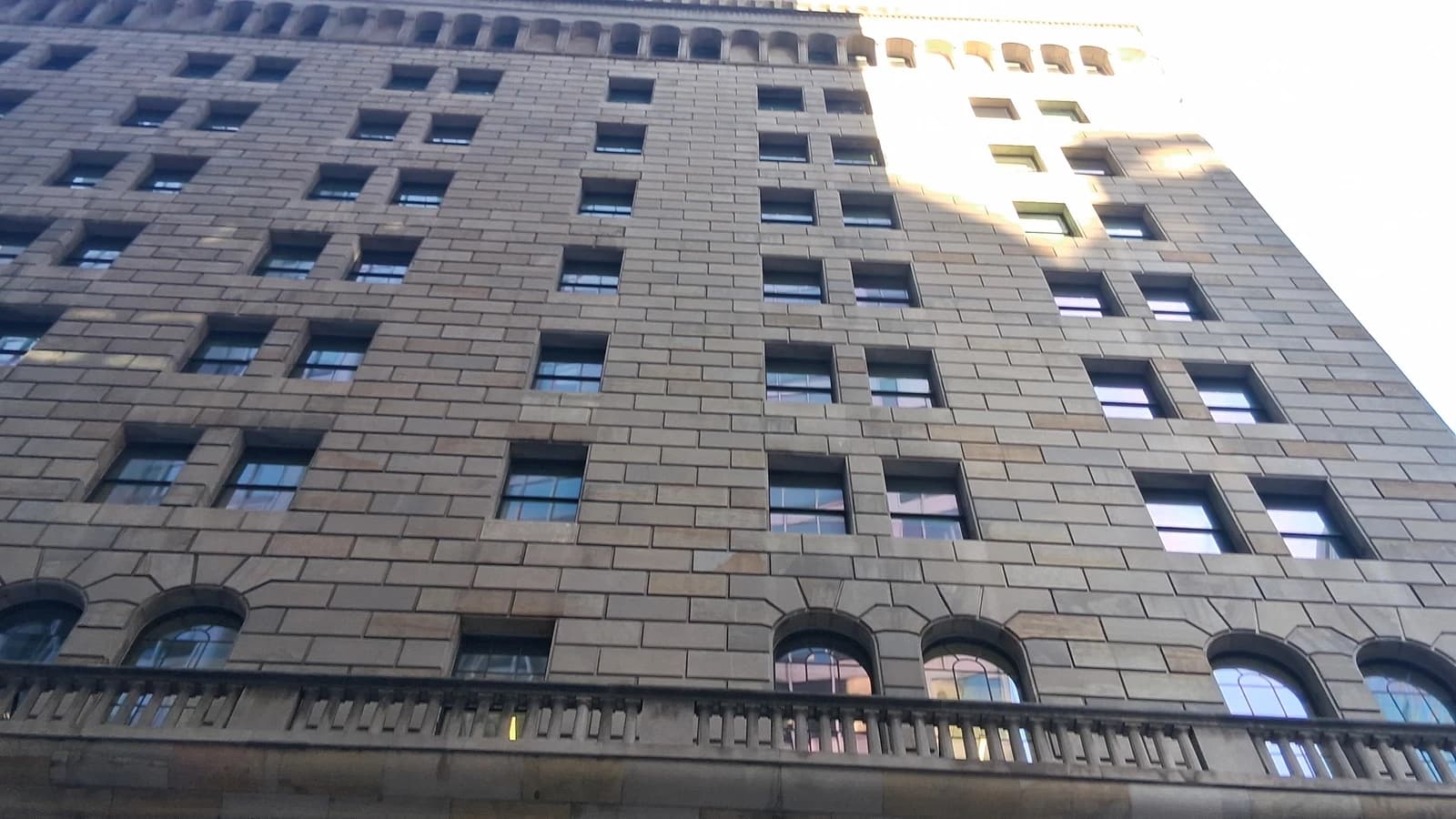 Exterior facade of the Federal Reserve Bank of New York building.
