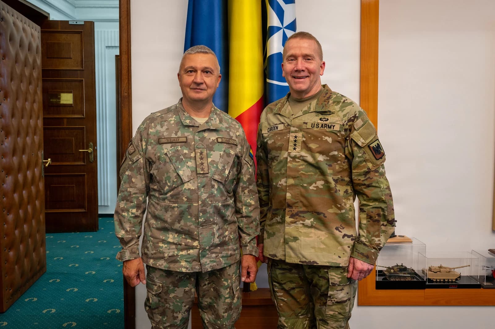 US Army Brigadier General Carden and Romanian General Vlad standing for a photo.
