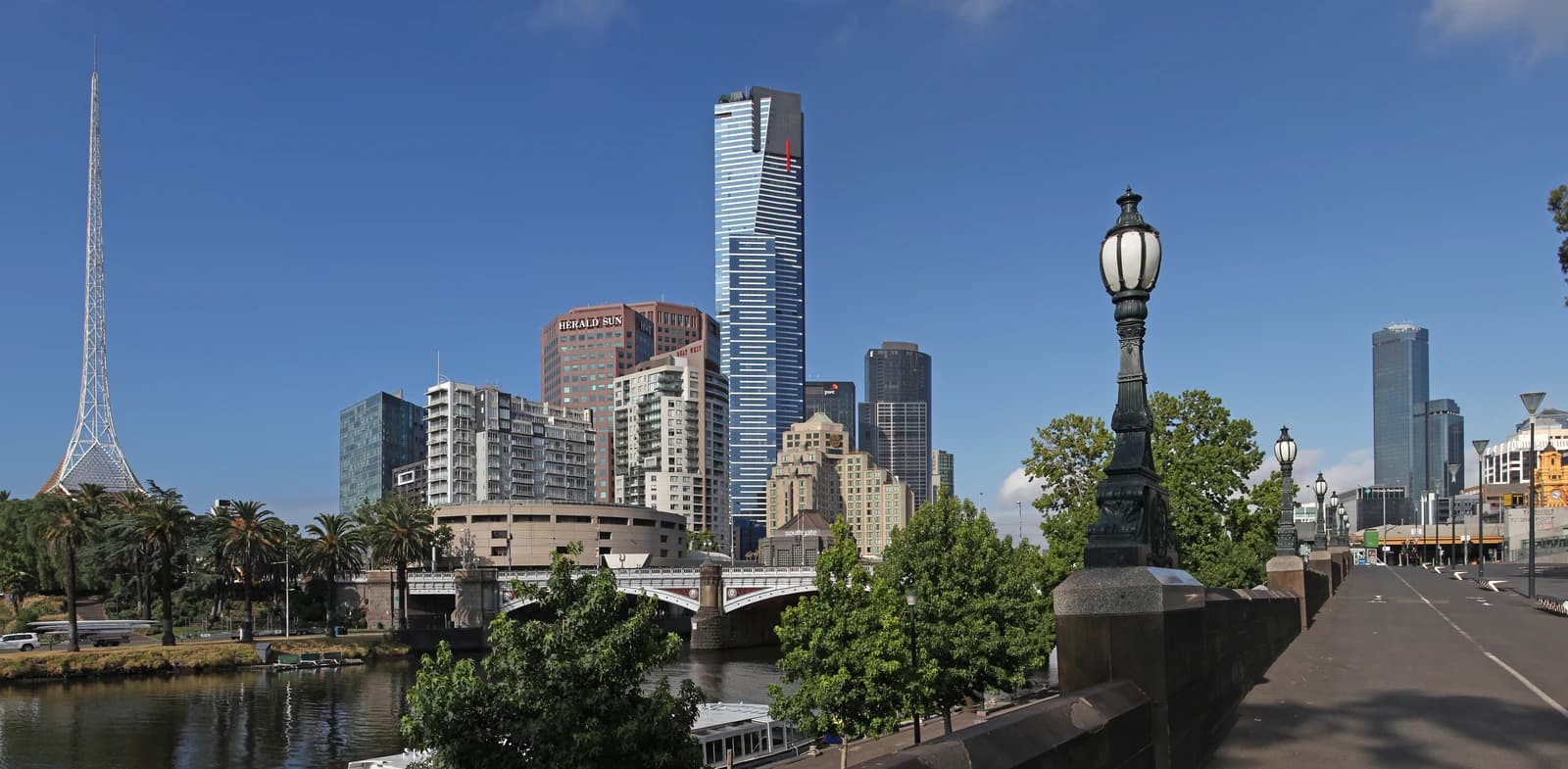 Melbourne cityscape featuring the Eureka Tower, Yarra River, and Princes Bridge.