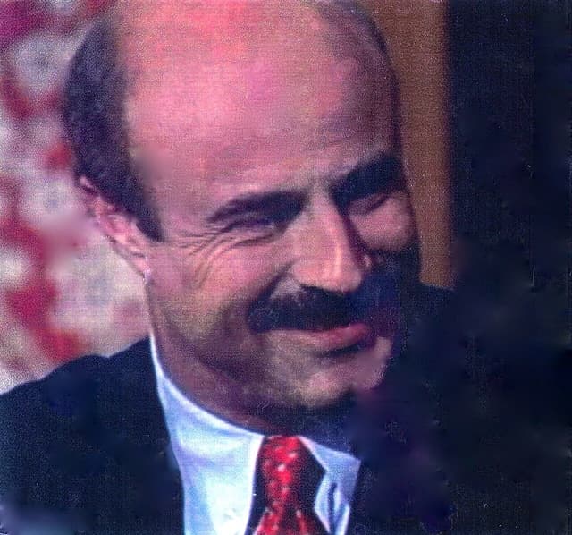 Dr. Phil McGraw, television personality, smiles during his 1991 pilot.