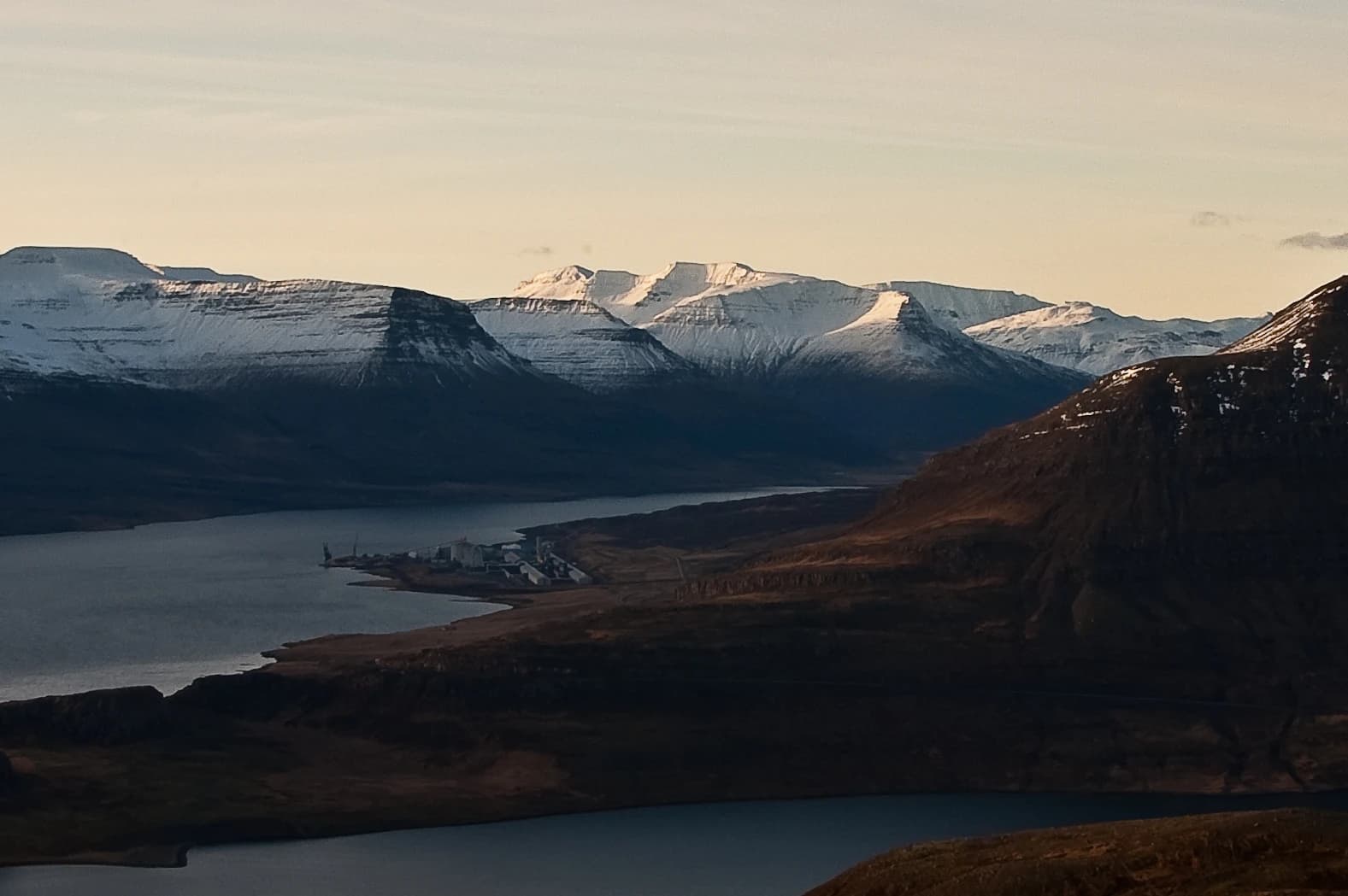 Aerial view of the Fjardaal Alcoa aluminium smelter located on a Fjord in Iceland.