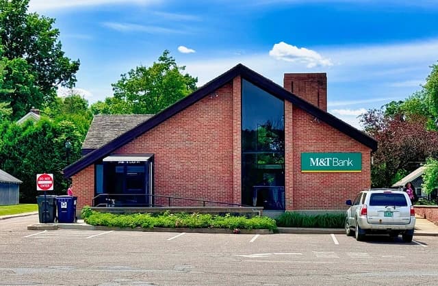 Exterior of an M&T Bank branch building on a sunny day.