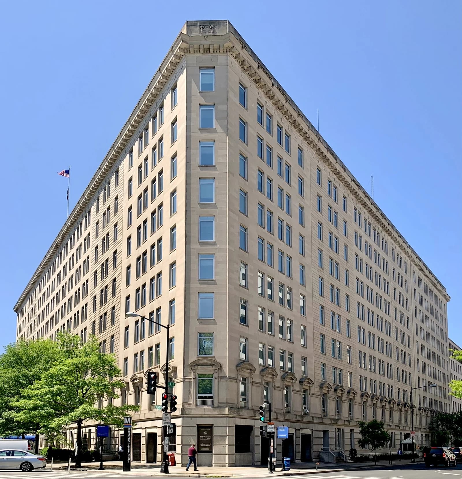 Veterans Administration Building in Washington, D.C., under a clear blue sky.
