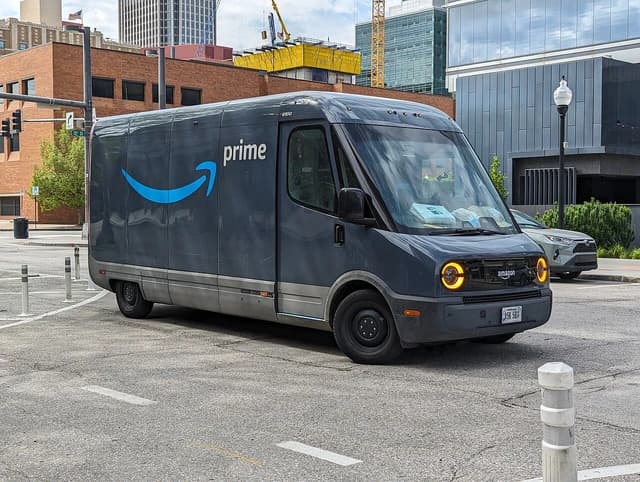 Amazon Prime delivery van on a city street in Omaha, Nebraska.