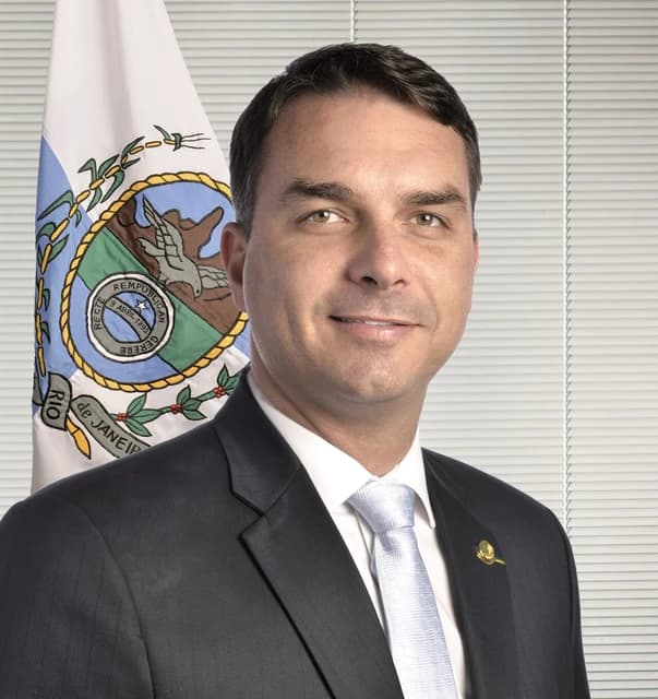 Flávio Bolsonaro, a senator from Brazil, looking forward and smiling.