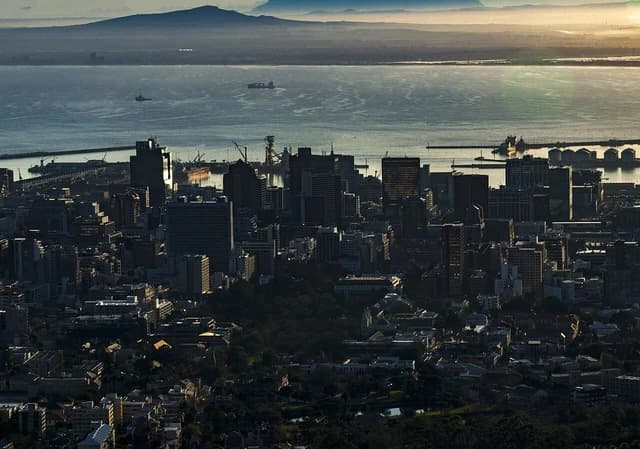 Aerial view of Cape Town Central Business District and harbor in morning light.