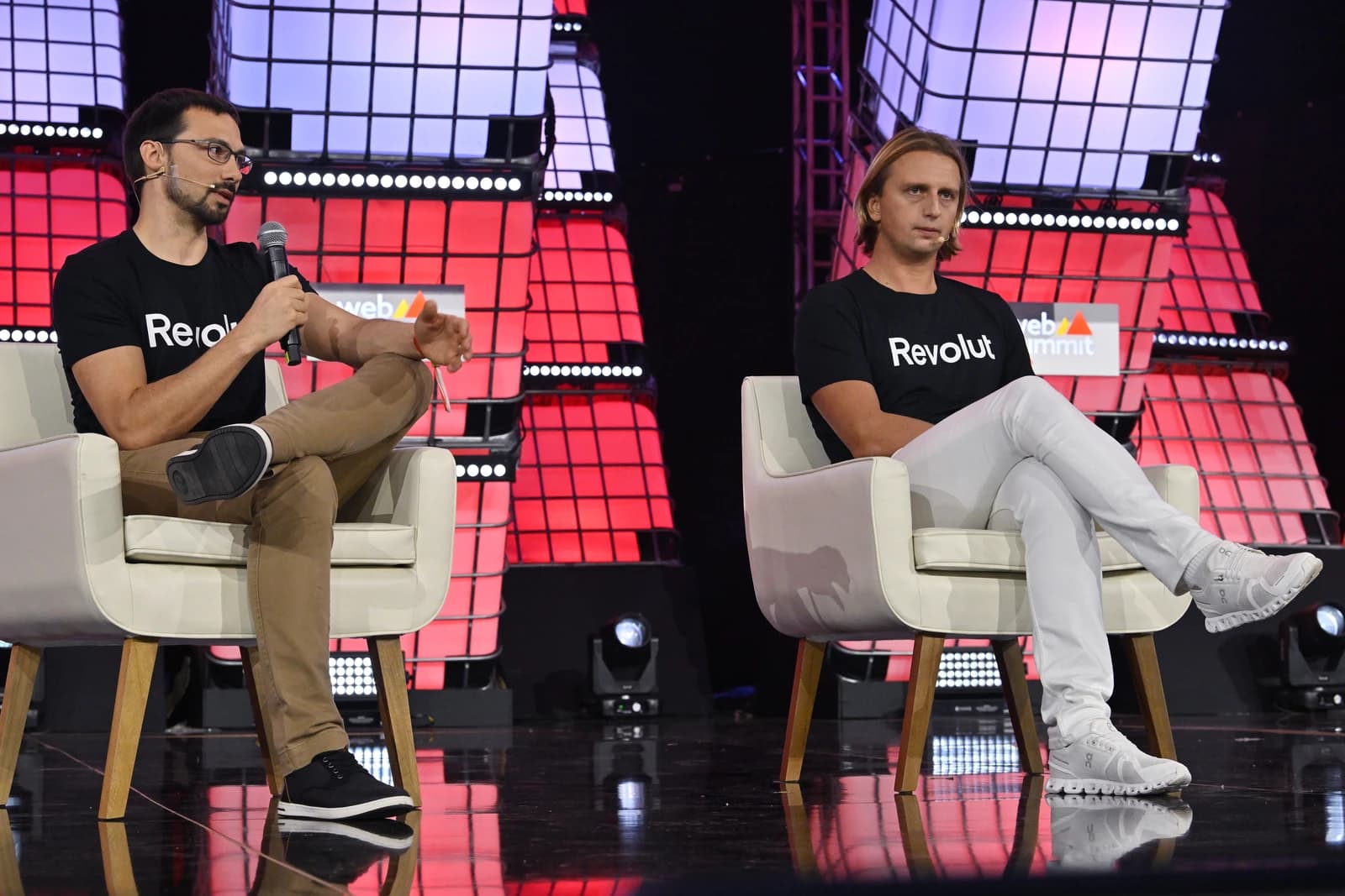 Vlad Yatsenko and Nikolay Storonsky, Revolut co-founders, seated on a stage.