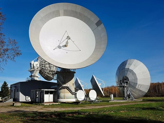 Satellite dishes and support buildings at the Dubna space communications center.