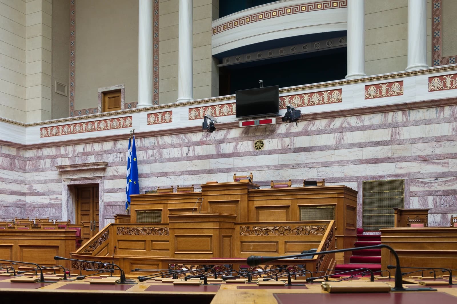 Empty assembly hall inside the Hellenic Parliament building in Athens, Greece.