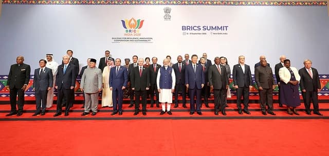 Leaders of BRICS and partner countries stand for a group photo at the BRICS Summit.