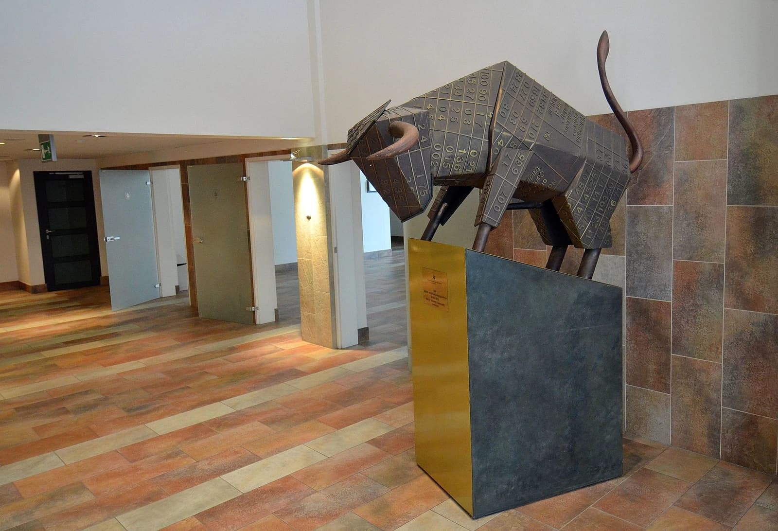 Bull sculpture inside the Warsaw Stock Exchange building, Warsaw, Poland.