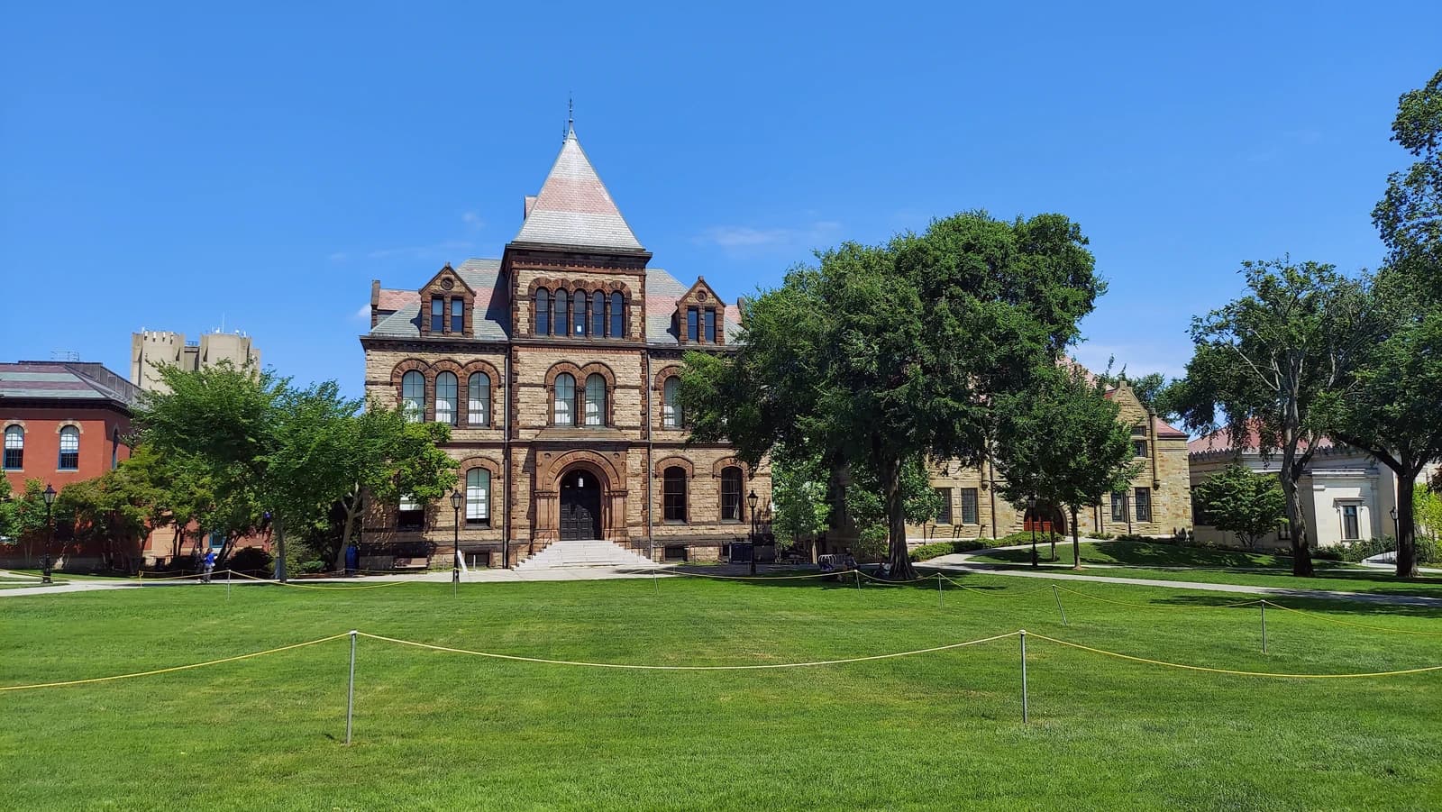 University Hall, a historic brick building with a central spire, on Brown University campus.